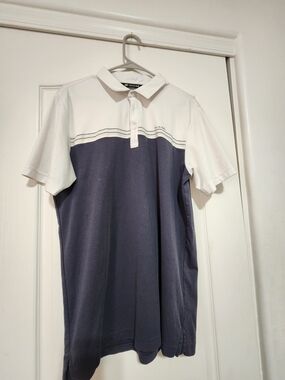 Travis Mathew White and Navy Two-Tone Polo